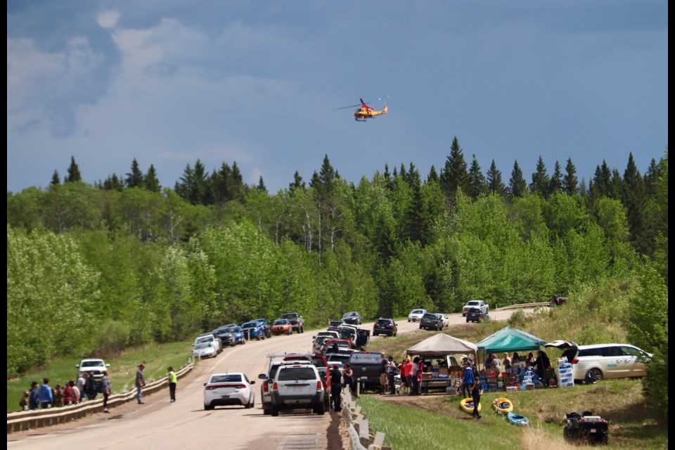 Yesterday, volunteers and local authorities searched the area where 17-year-old Aaron Thir fell into the Beaver River while fishing with his brother. 