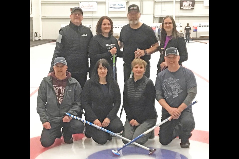 Lac La Biche Mixed Curling Bonspiel A Event winners: (standing)  Rodney Oullette, Christa Shulman, Baz Churko and Tina Cormier: Second place: (front)  Pat Meyer, Joanne Meyer, Lyle Nowicki and Stacey Nowicki.