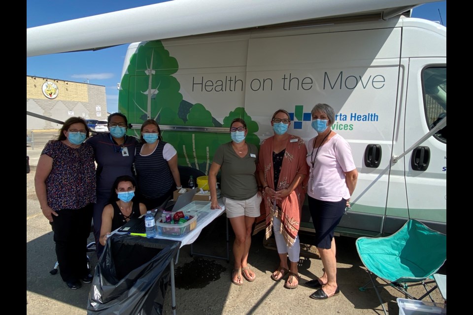 Local nursing staff on hand to provide easy access to first and second dose COVID-19 vaccinations in St. Paul at the AHS mobile health van Wednesday were (left to right): Cindy Briggins, Nicole Blais (kneeling), Alyanna Cayanan, Morgan Yurkowski, Kim Reszel, Carmen Gerlinsky and Becky Lupul.