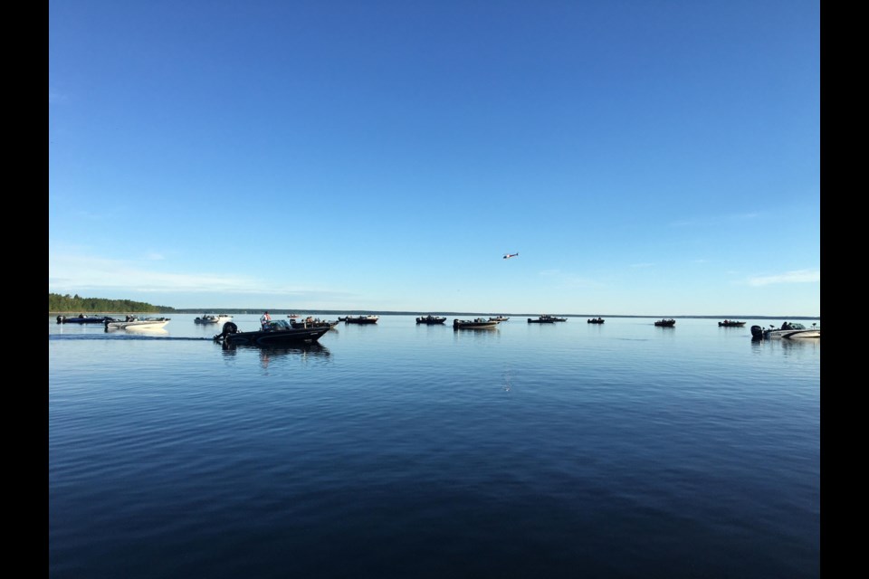 ... on the lake.  About 80 boats and more than 175 anglers hit the waters of Lac La Biche Lake this morning for the first of two days competing in the inaugural La Biche Walleye Cup. The morning starts are split into two groups with half the entry heading out at 7 am and the remainder at 8.  The fisher-folk will be on the lake until 3:30 each afternoon, looking for the largest walleye in the catch-and-release tournament.  