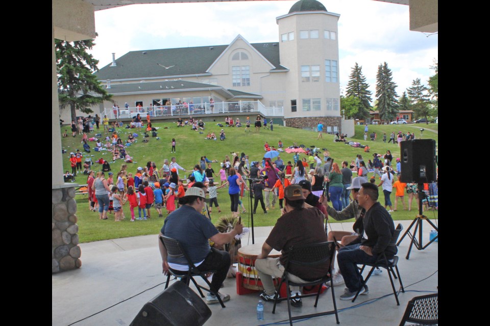 Saddle Lake drummers and dancers entertain the crowds at Lac La Biche's McArthur Park during National Indigenous Peoples Day on June 21.