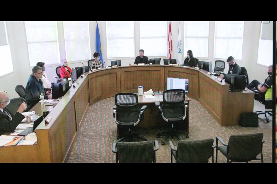The new, dark-stained desk completes the horse-shoe in council chambers, where new IT equipment is also expected.