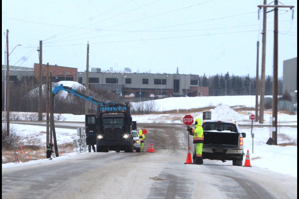 Fortis and local contractors were installing new streetlights and power poles on the access road to the Beaver Lake hamlet. The last part of the work — on Valentine's Day —  requires a two-hour power outage, say company officials.