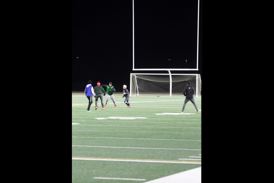 Lac La Biche's adult soccer team had a kick-about on a chilly Sunday night under the Bold Center sports field lights. With darkness falling an hour earlier after the weekend time change, the field lights were burning bright at 6 pm.
