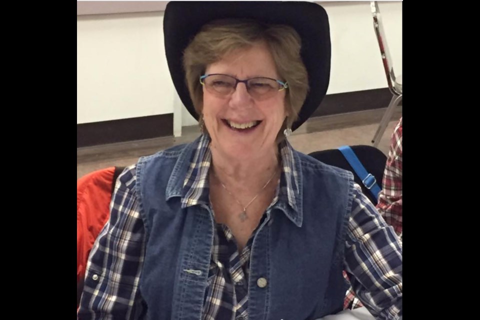 A big smile and a big hat.  Hodgins at one of the many recent fundraisers she has helped with as a member of the local Rotary Club
