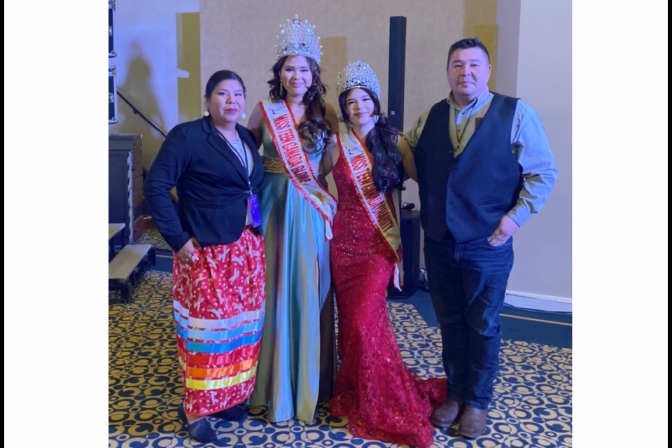 Arianna Heaven Faithful (middle-left) and Jorja Hunter (middle-right) pose for a photo with their parents.