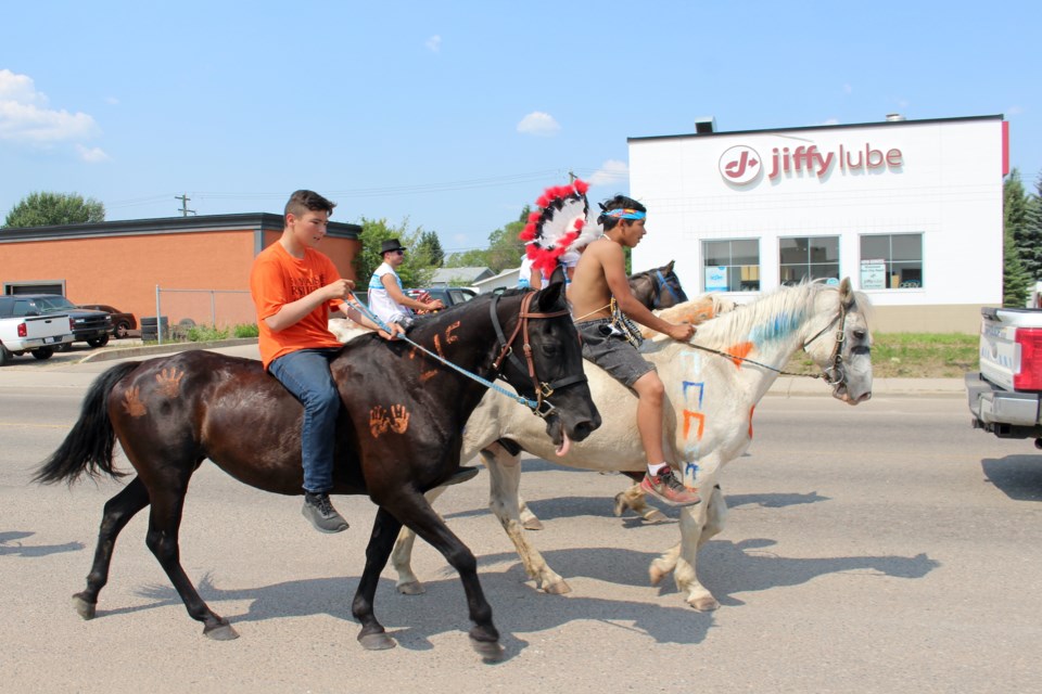 Participants of the Xtreme Indian Relay Races participated in the Let’s Go, Lakeland Parade on July 9.