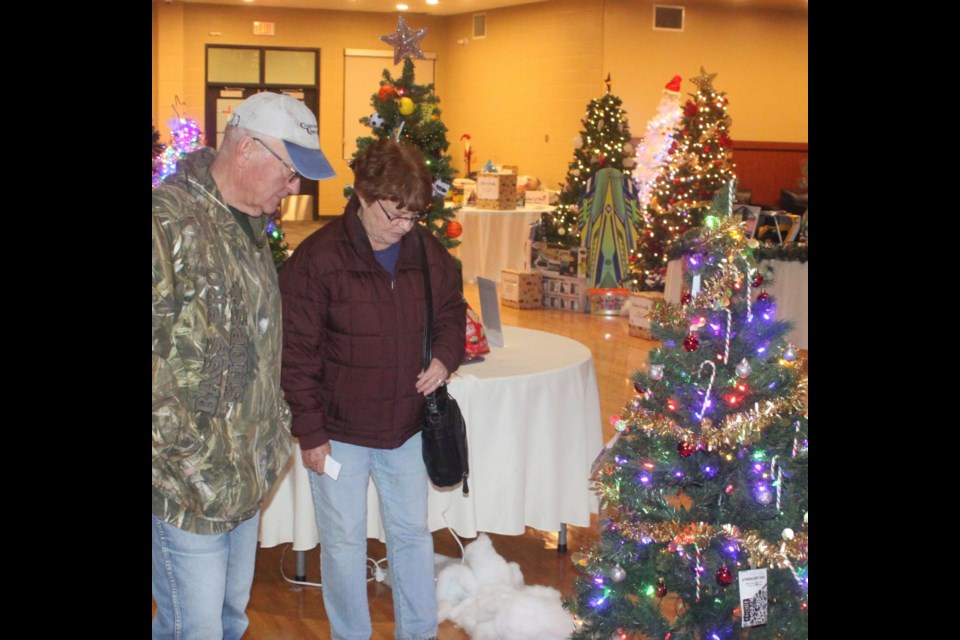 John and Joyce Charchun were quite impressed by the multitudes of multicoloured and decorated trees inside the Bold Centre Community Hall for the 2023 Lac La Biche Festival of Trees. Chris McGarry photo.