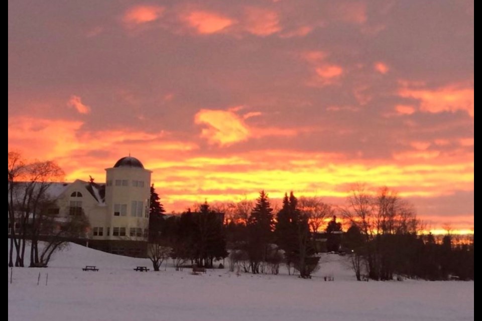 Wish you were here: Lac La Biche County's civic offices at McArthur Place look like a postcard setting during a recent northern Alberta sunset.        Image Rob McKinley