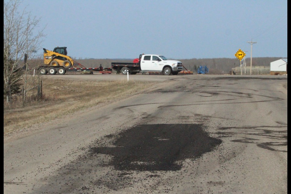 Tis the season. Lac La Biche County road staff have been busy on area roadways, helping to make for smoother travels. Here, a crew just finished up a wide pothole at Range Road 135 and Township Road 660 near the Beaver Lake Cree Nation. Residents are encouraged to call in pothole complaints by using the county’s see-click-fix app.