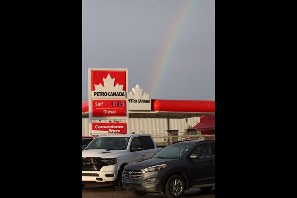 It looks like a rainbow ends at this Lac La Biche gas station after Tuesday night's rain shower.  Local MLA Brian Jean wants all Albertans to share in the pot of gold he says the fuel industry is benefitting from.