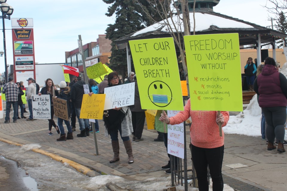 Protestors rally against COVID-19 pandemic restrictions in Bonnyville Sunday.