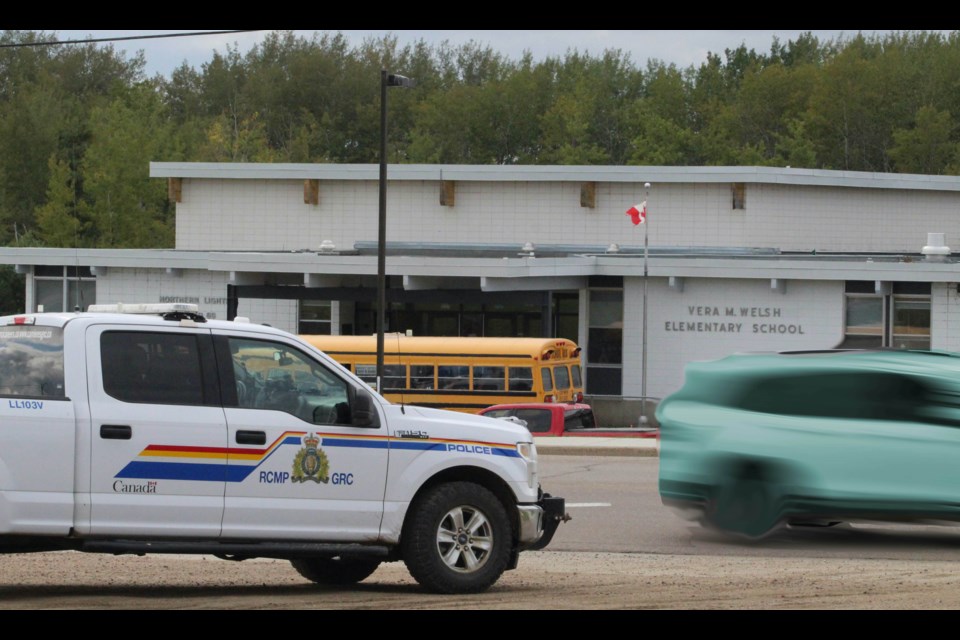 A police vehicle watches traffic in the school zone near Lac La Biche's Vera M. Welsh School. School division officials say they are speeding towards a point of no return when it comes to government funding and construction to replace the 70 year old building.