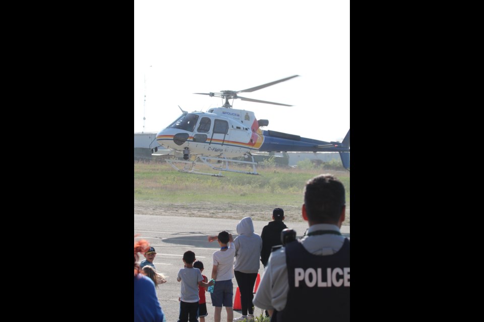 The RCMP helicopter takes off from Thursday afternoon's RCMP open house and community barbecue at Lac La Biche's Bold Center.