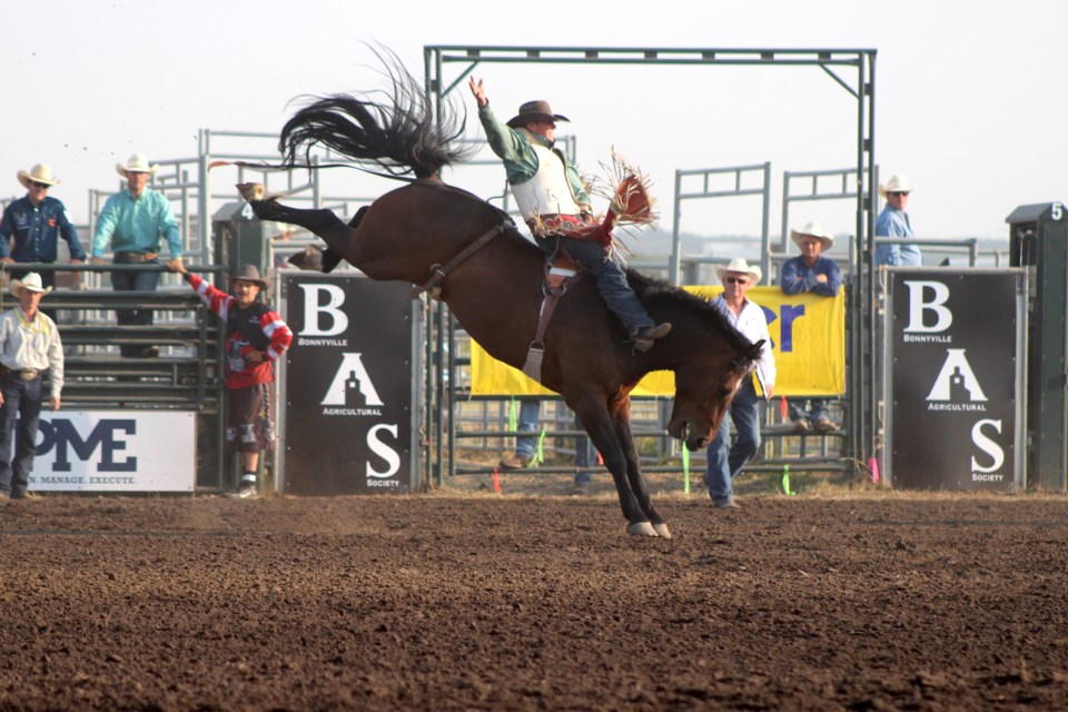 Ky Marshall held on during the bareback riding event at the Bonnyville Pro Rodeo on Friday, July 9.