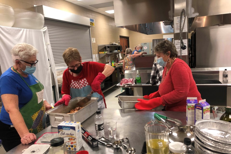 Lac La Biche Rotary Club members were working busily in the Bold Center kitchen on November 27, getting 104 dinners ready for residents.  Funds raised from the $25 per plate event are going to the Waskaysoo Food Bank.
Image Rob McKinley
