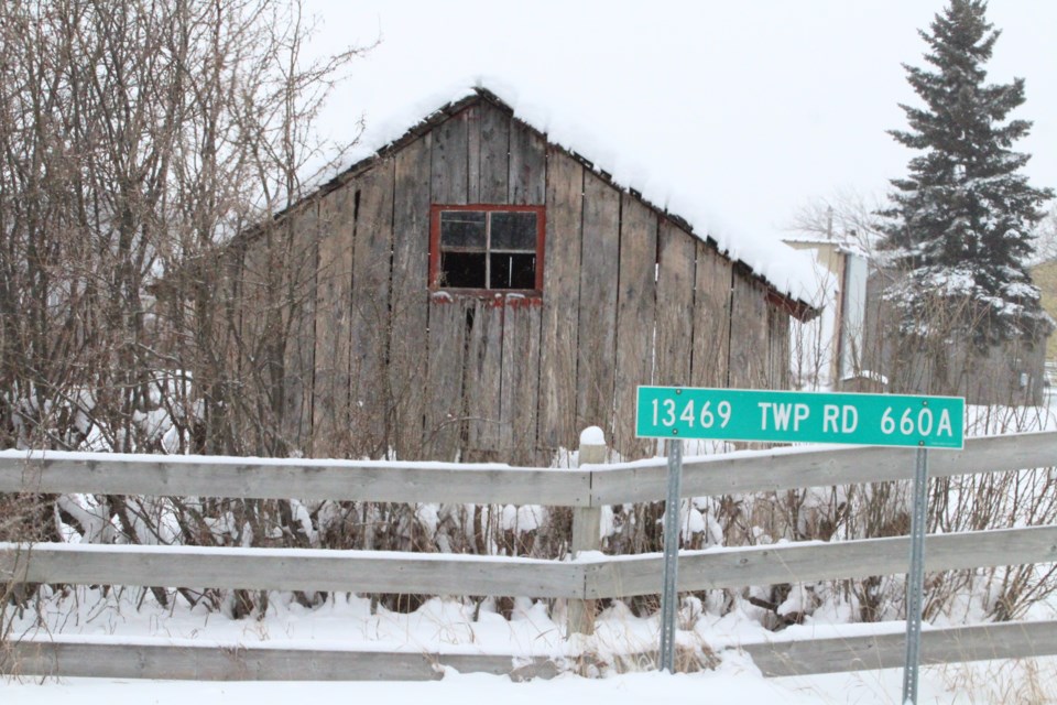 Rural address signs, like this one, should all be on the same signs and displayed for emergency crews to see.