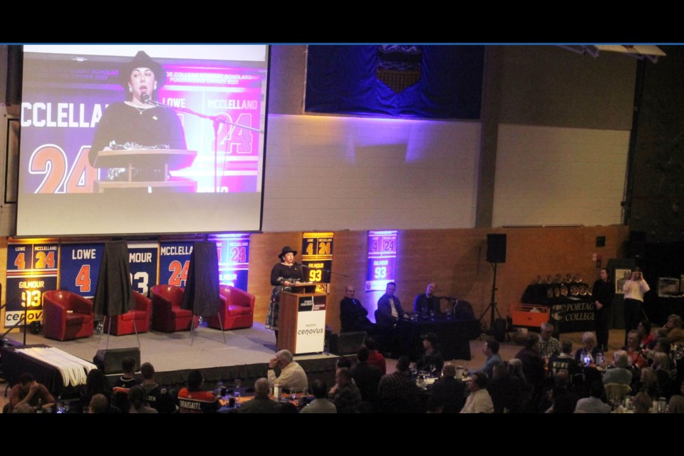 Portage student Sarah Fedoruk speaks to the crowd at the recent Portage College Scholarship Night. NHL alumni Kevin Lowe, Kevin McClelland and Doug Gilmour were part of the night, raising funds for student scholarships.