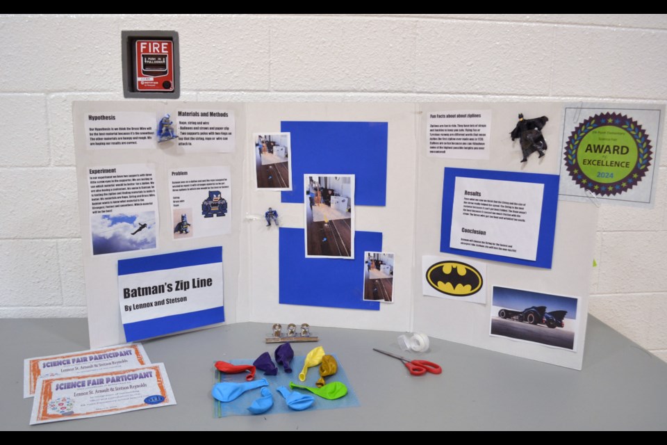 Grade 5 students Lennox St. Arnault and Stetson Reynolds received an Award of Excellence for their superhero themed experiment, ‘Batman’s Zip Line’.