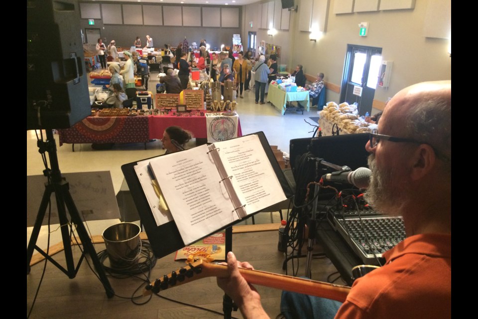 Paul Shaw was the background music at Friday's Lac La Biche Farmers' Market.