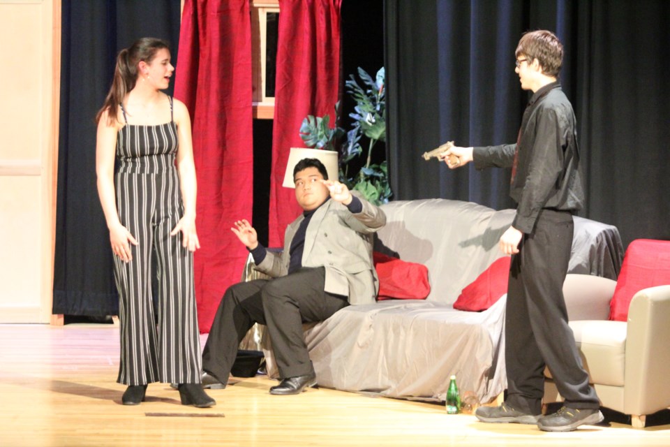 Actors Nino Benedict Rabe, Aisley Kruk and Christopher Henderson is a scene of Waiting for Death, during Wednesday night's presentation at McGrane Theatre.
