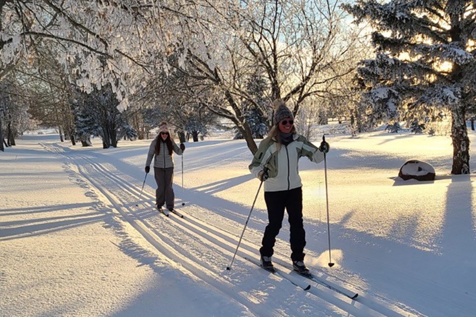 Jana Dechaine and Sharon Richardson ski at the golf course in St. Paul, enjoying the winter weather early in 2023.
