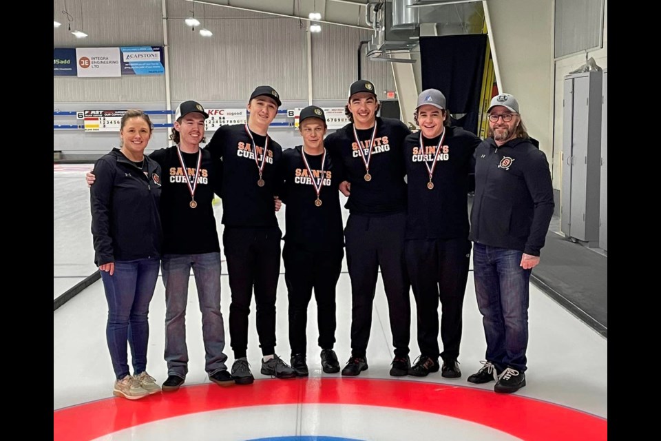 The St. Paul Regional High School boys' curling team came home with bronze medals from this year's NEASAA zone competition. Pictured is Angela Noel, Michael Elliott, Ethan Noel, Porter Dallaire, Tyson Kotowich, Caleb Gratton, and coach Richard Gratton.