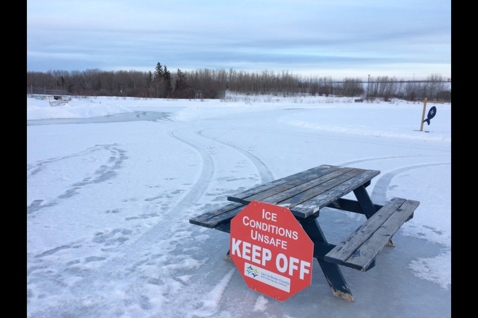 Municipal crews have put a warning onto the Alexander Hamilton Trout Pond's ice surface. The park is normally the home of a skating circuit, ice fishing area and shinny hockey rink. With cooler temperatures expected across the region this week, municipal crews are expected to return to the ice to finish the work.