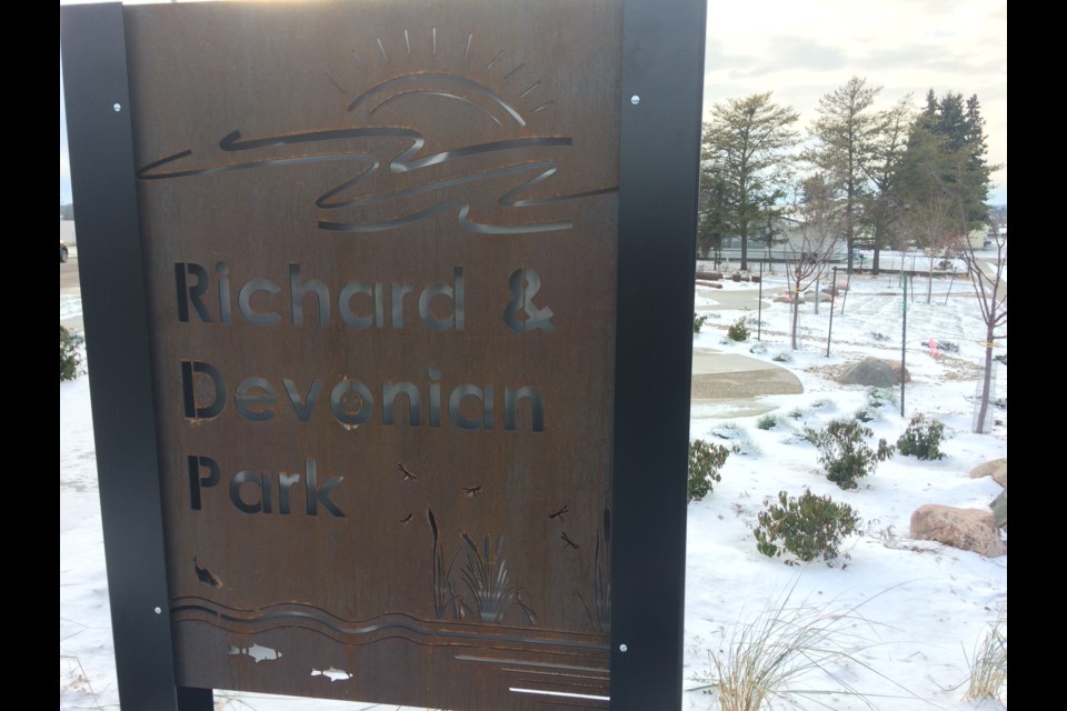 The sign will stay as it is, despite one councillor's efforts to get the wording changed. The family of the park space agree with the current wording.