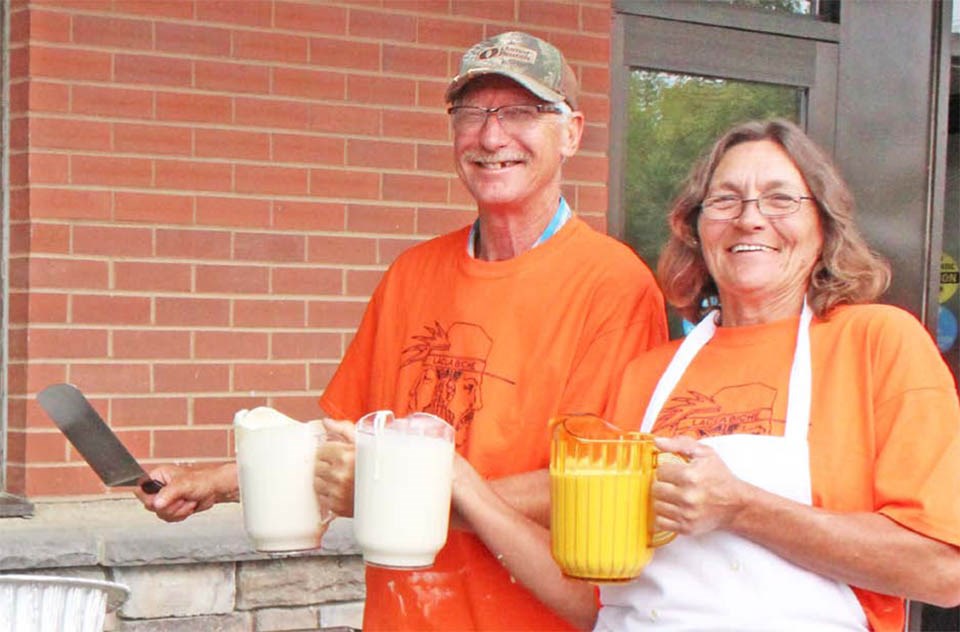 Morning smiles from folks like Tom Fabbro and Sylvia Broadbent — and lots of pancake mix and orange juice — will greet guest to Friday and Saturday's pancake breakfasts at the Lac La Biche Heritage Society.