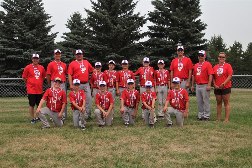 The U11 St. Paul Storm baseball team is made up of: (front) Keiren Gratton, Ezrik Sundt, Caleb Poulin, Marco Hladunewich, Mason Naundorf, Ryan Noel, (back) Norm Noel, Glenn Hladunewich, James Robinson, Jayden Kully, Deklyn Robinson, Colson Maheu, Colby Sadlowski, Wyatt Fontaine, Chad Kully, Daryl Naundorf and Angela Noel.