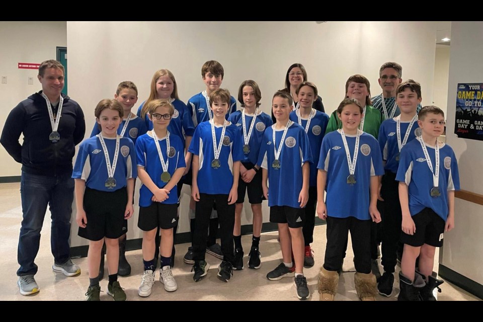 The U13 boys' team from St. Paul coached by Glenn Andersen won gold at Polar Cup in their division.