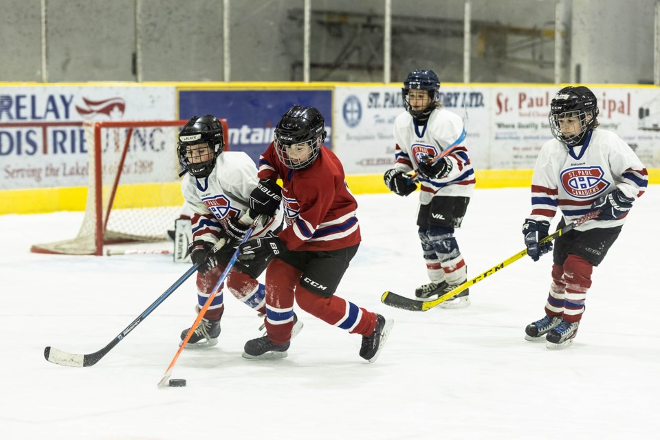 St. Paul Blue and St. Paul White play against one another on Sunday morning.