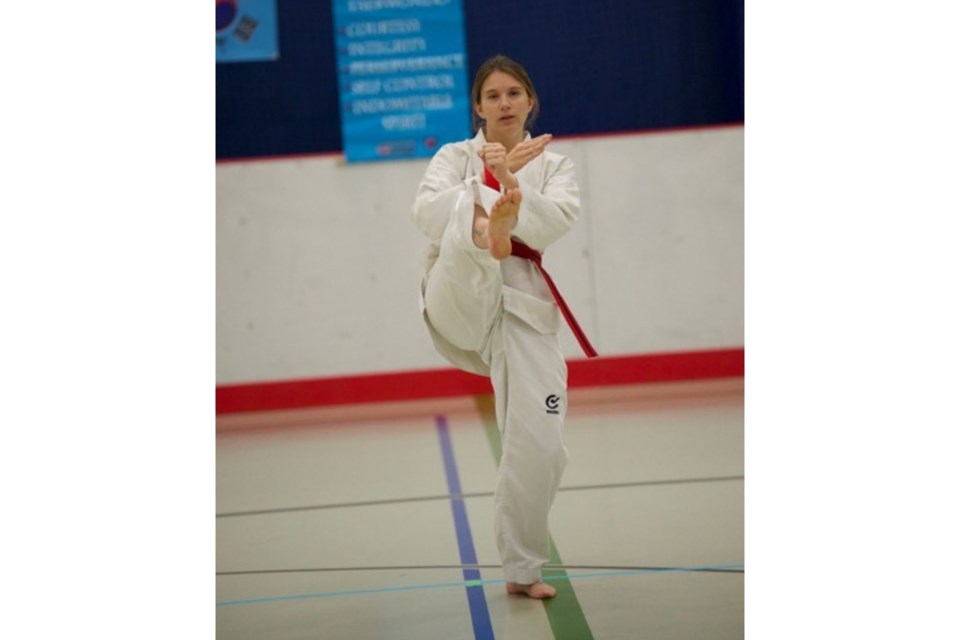 Jailyn Corbin during her black belt testing. Photo taken by: Darryl Hansen