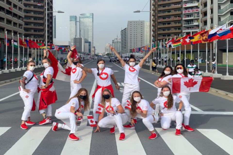 Team Canada's sitting volleyball athletes pose for a fun picture in Tokyo. The team finished fourth overall at the recent Paralympic Games.