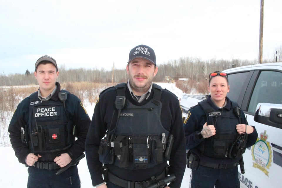Lac La Biche County Peace Officers Melissa Young, Warren Young and Austin Zedel were able to assist two people injured during a rural house fire on December 5.