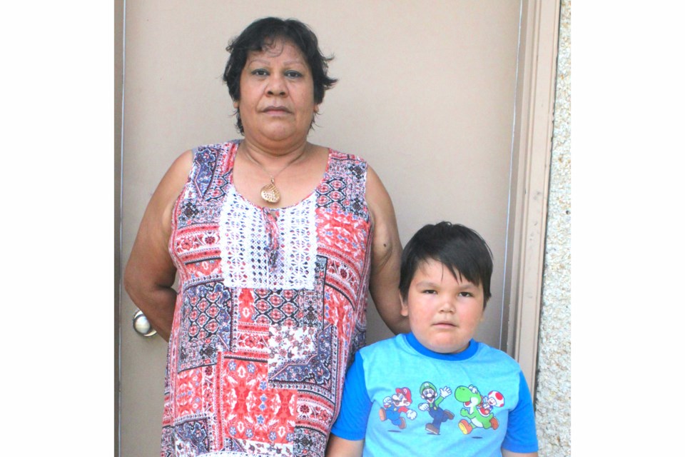 In early May, Lucille Laboucan, her son, Judah, and daughter, Lataya (not in photo) were evacuated from the community of Fox Lake in Little Red River Cree Nation, about 850 kms north of Edmonton, along with over 3,000 other residents due to wildfires spreading throughout the region. Laboucan has made a new home for herself in Lac La Biche and will soon begin working on a two-year social work diploma at Portage College. / Chris McGarry photo. 