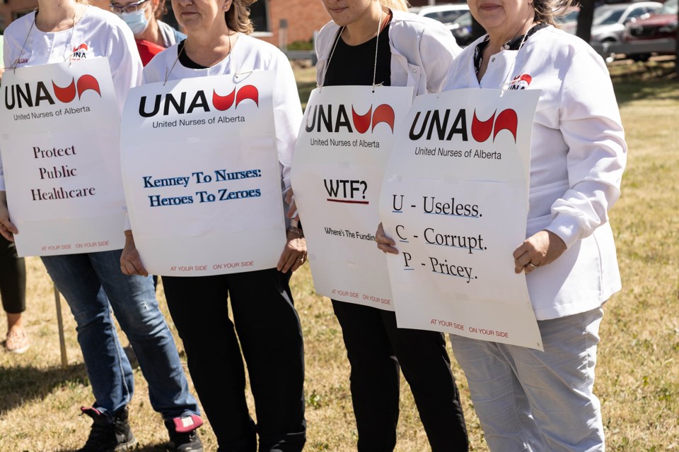 Signs with messages showing a clear displeasure toward the UCP government were worn by some.
Janice Huser photo