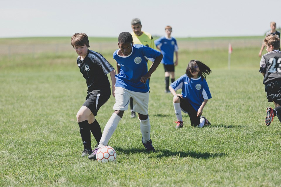 Action from a Sunday afternoon game between the Bonnyville-Lac La Biche United and St. Paul United U13 boys' teams. The team from Lac La Biche-Bonnyville would win gold at Lakeland Cup.