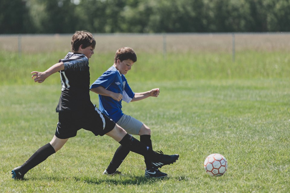 Action from a Sunday afternoon game between the Bonnyville-Lac La Biche United and St. Paul United U13 boys' teams. The team from Lac La Biche-Bonnyville would win gold at Lakeland Cup.