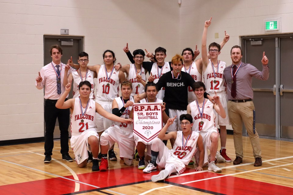The Ashmont Falcons show off the SPAA basketball banner.