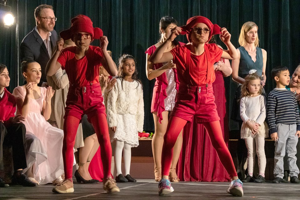 A couple of monkeys perform at the beginning of the show. Esther St. Arnault and Kaeley Grossschedl are pictured.