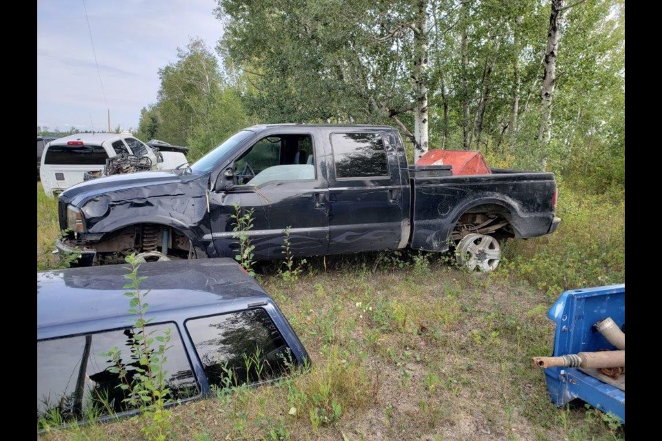 The stripped remains of the Ford F350 believed to have been stolen and used in an alleged fuel theft. Two area men are facing charges.