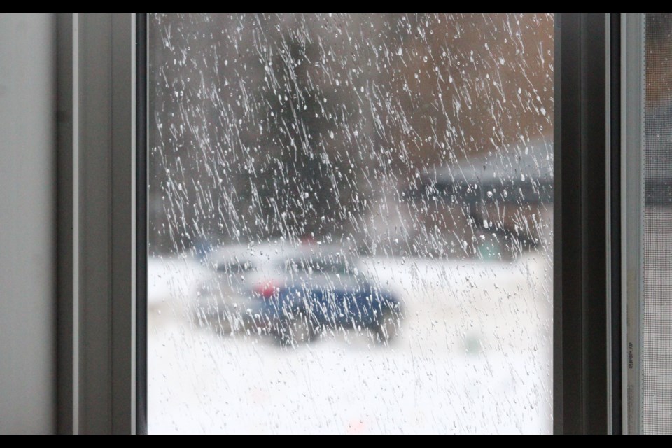 The view from most Lakeland-area windows is like this as a freezing rain warning covers the area.  Local police are urging motorists to stay off area roads.