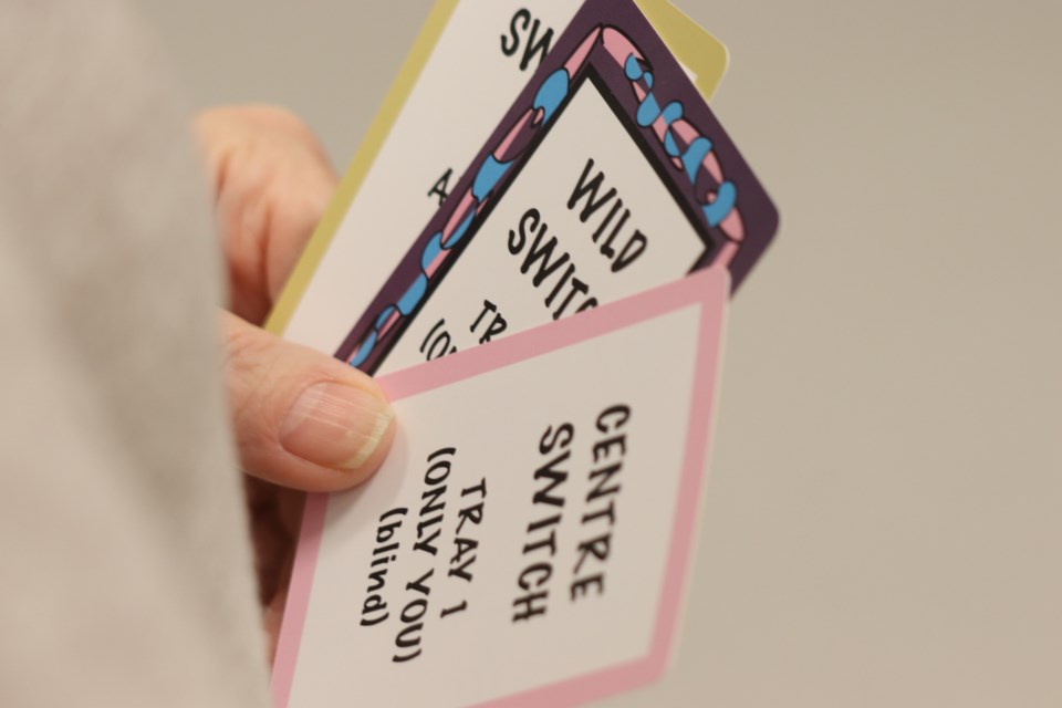 Sue Warholik is the mastermind behind a game called SWITCH-Em. Pictured are pieces of the game. 