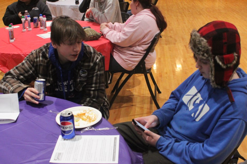 During Friday's FCSS Teen Chill Zone trivia event featuring questions about the Marvel comics universe, local youths used their cell phones to answer and submit questions. Chris McGarry photo. 