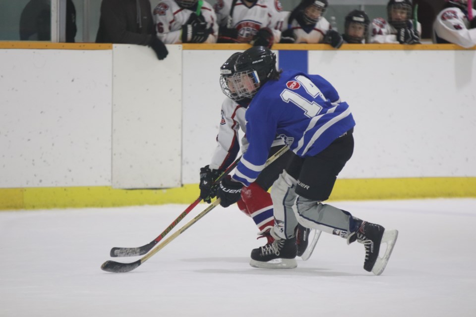 St. Paul and Two Hills face off in a pond hockey match on January 14.