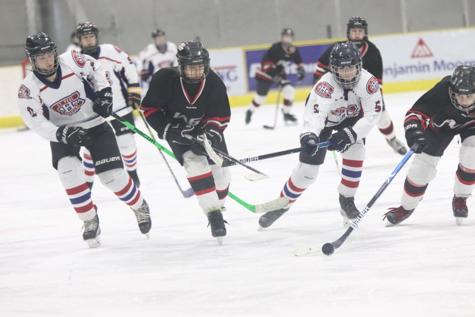 During the St. Paul U15 Female Hockey Tournament, the St. Paul Canadiens faces off against the Lakeland Jaguards on Jan. 22 at the Clancy Richard Arena.