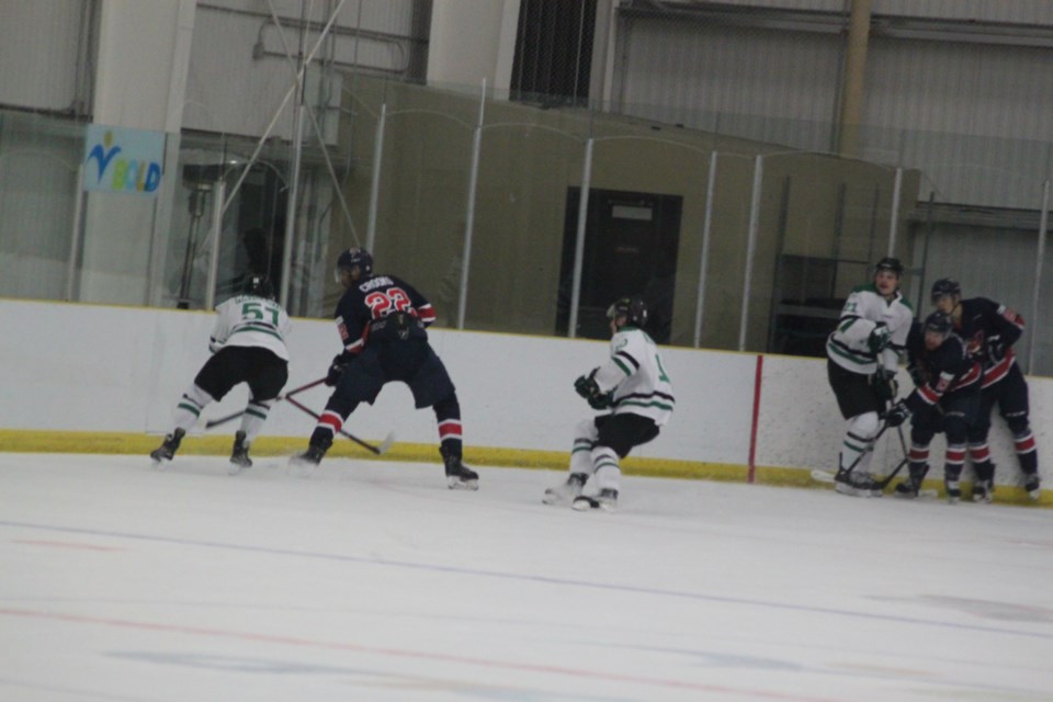 Members of the current line-up of the Portage College Voyageurs men's hockey team battle it out on the ice with the Red Deer Polytechnic Kings during a recent match at the Bold Centre. Chris McGarry photo. 