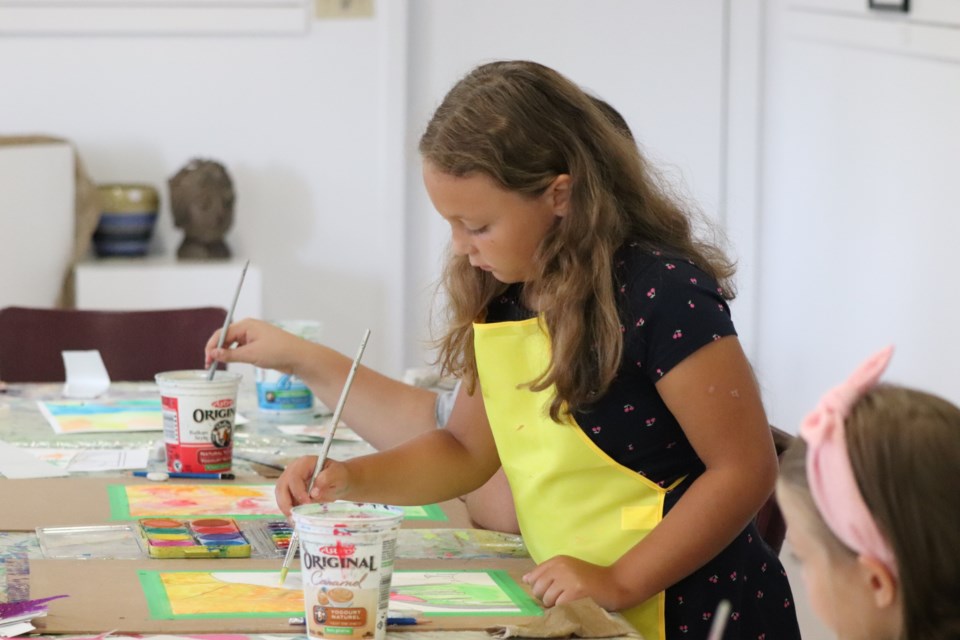 Young artists create art during a camp on Aug. 11 at the St. Paul Visual Arts Centre.